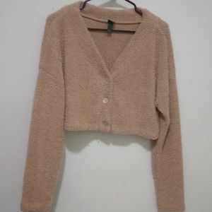 Brown sweater with low v neck
